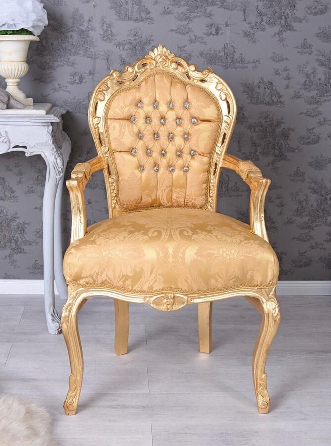 ANTYKI 24 Antieke barokfauteuil met gouden details en fluwelen bekleding