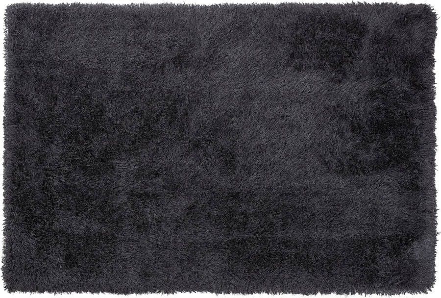Beliani CIDE Shaggy vloerkleed Zwart Wit 140 x 200 cm Polyester