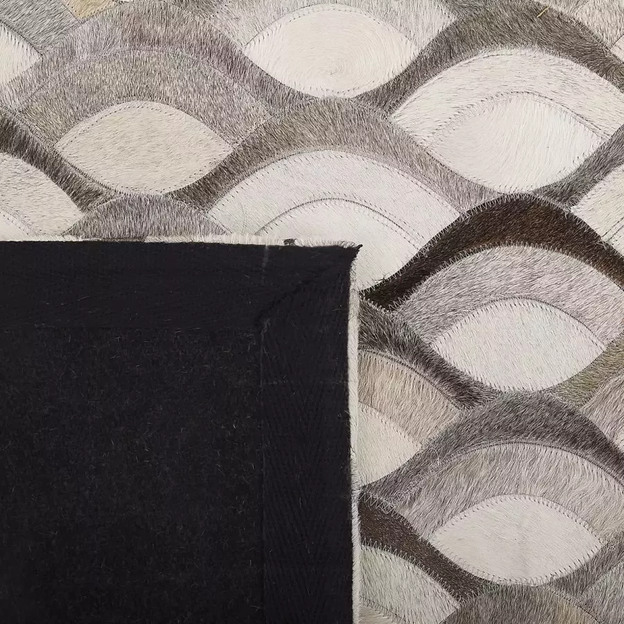 Beliani KIRCA Patchwork vloerkleed Bruin 140 x 200 cm Koeienhuid leer - Foto 3