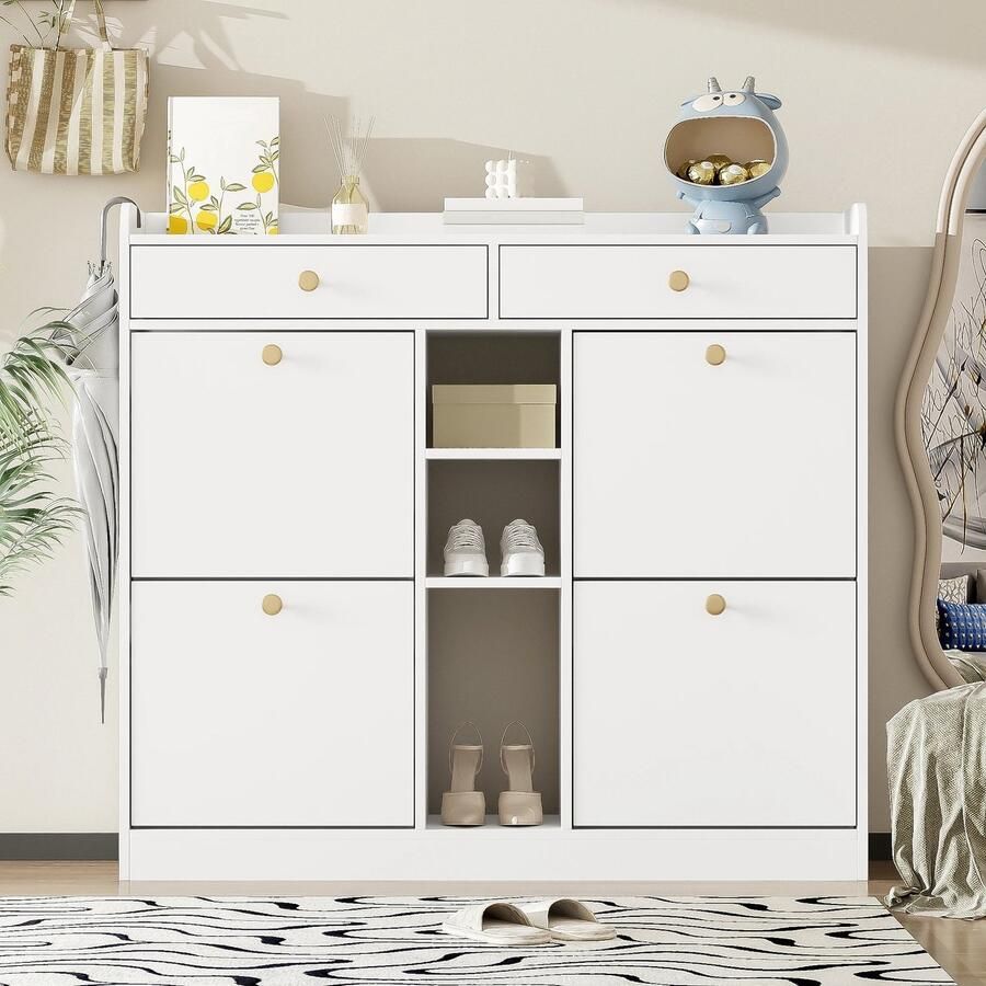 Deze informatie volgt later. Amalee Schoenenkast Witte dubbele schoenenkast Open en dichte compartimenten Met 2 lades 110 cm breed 100 cm hoog 26 cm Diep Ruime schoenkast