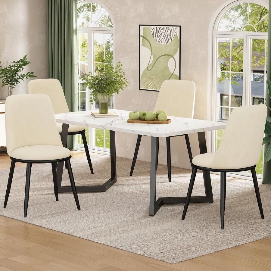 Deze informatie volgt later. Amalee Set van 4 eetkamerstoelen Beige Met zwarten poten Belastbaar gewicht 150 kg Fluwelen stoelen Stevig frame Comfortabel