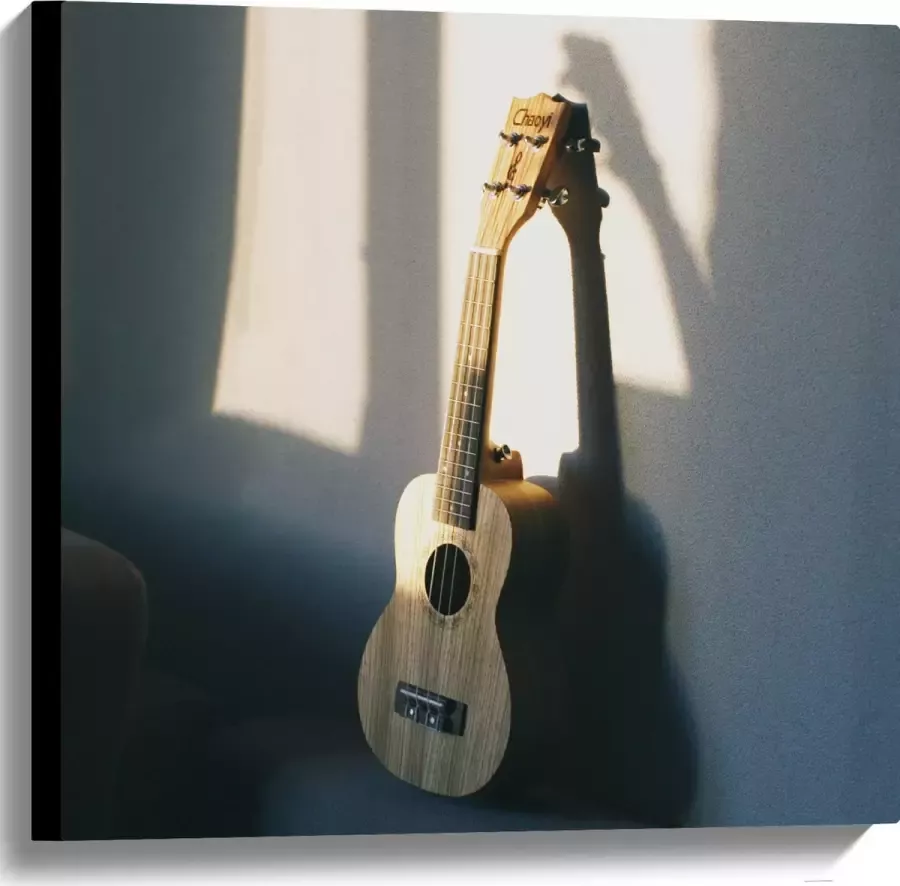 Canvas Houten Gitaar op Rand van Bank 60x60 cm Foto op Canvas Schilderij (Wanddecoratie op Canvas)