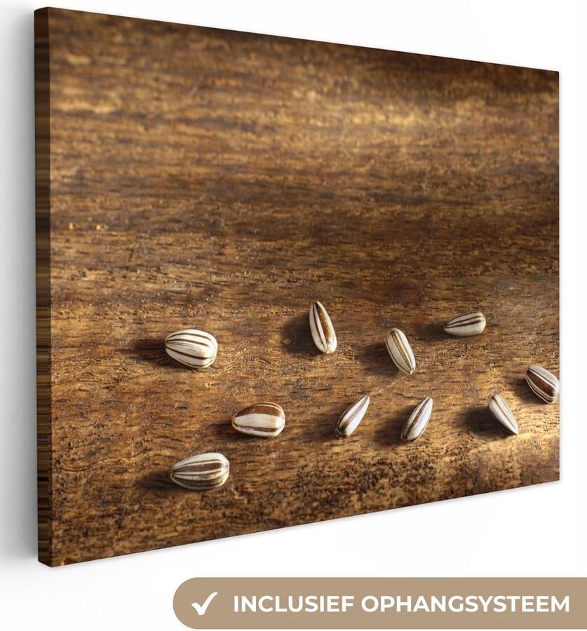 Canvas schilderij 120x90 cm Wanddecoratie Tien mooie zonnebloempitten op houten tafel Muurdecoratie woonkamer Slaapkamer decoratie Kamer accessoires Schilderijen op canvas - Foto 2