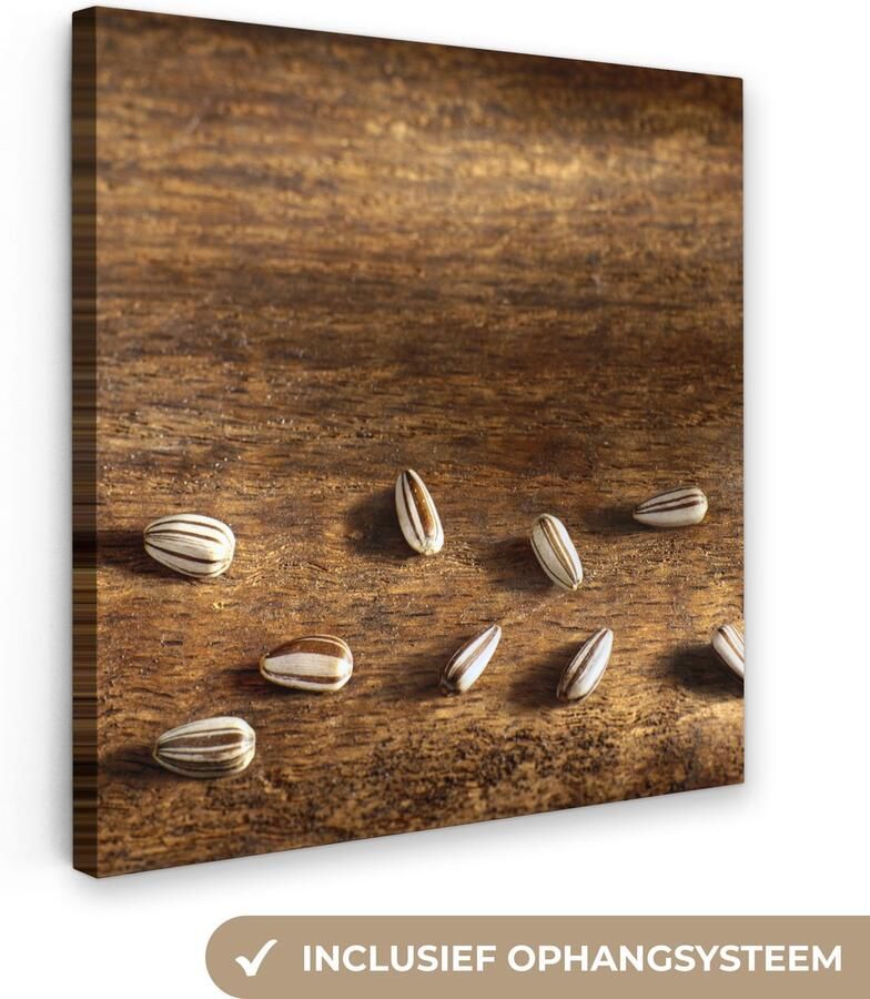 Canvas schilderij 20x20 cm Wanddecoratie Tien mooie zonnebloempitten op houten tafel Muurdecoratie woonkamer Slaapkamer decoratie Kamer accessoires Schilderijen op canvas - Foto 2