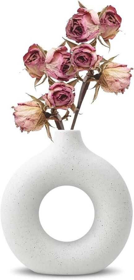 Cirkelvormige zwarte keramische vaas in eenvoudige Scandinavische stijl voor thuis bruiloft feest eettafel