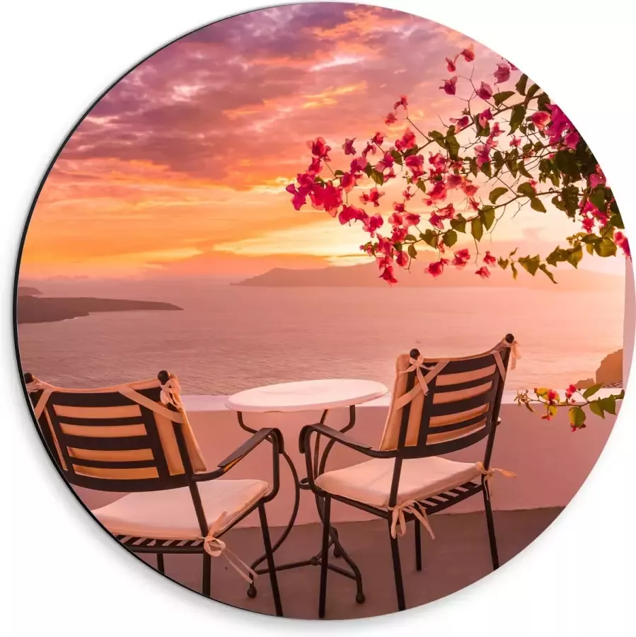 Dibond Muurcirkel Tafel met Stoeljes op Balkon met Roze Bloemenstruik met Uitzicht op Zee 30x30 cm Foto op Aluminium Muurcirkel (met ophangsysteem)