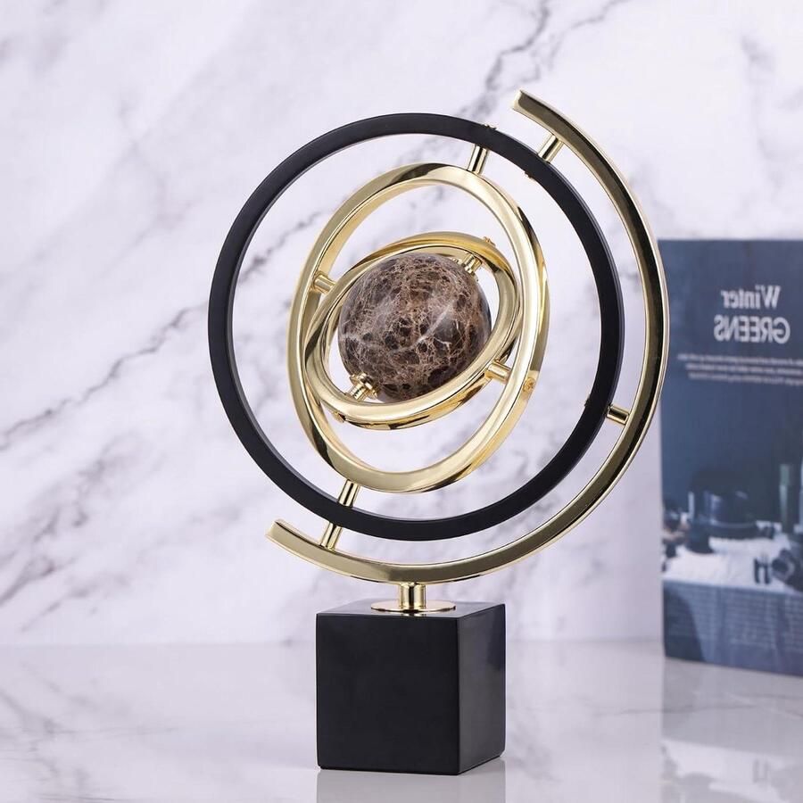 Premium Moderne sculptuur abstracte kunst metalen globe ornament zwart en goud draaibaar standbeeld voor bureau boekenkast en woonkamer