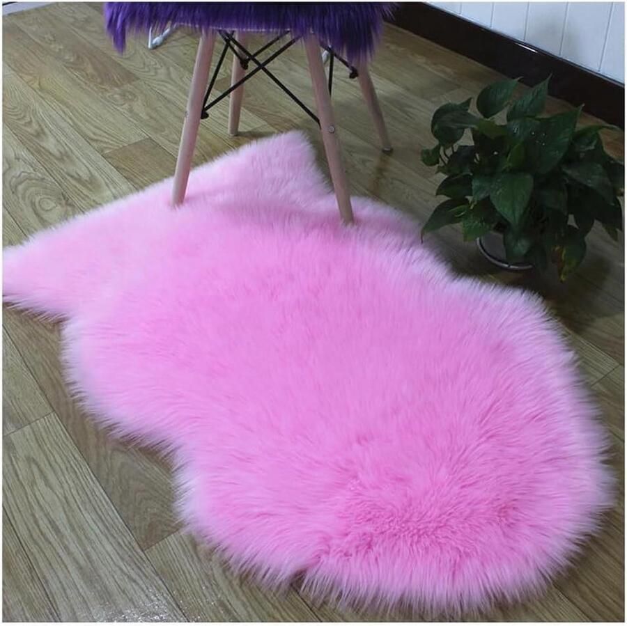 Roze langharig zacht pluizig lamsvacht schapenvacht tapijt voor bed 45 x 65 cm