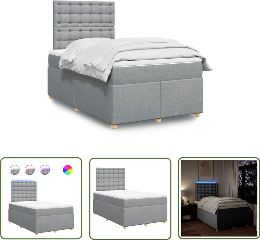VidaXL Boxspring met matras stof lichtgrijs 120x190 cm Boxspring Slaapcomfort Led Verlichting Hoofdbord Matras