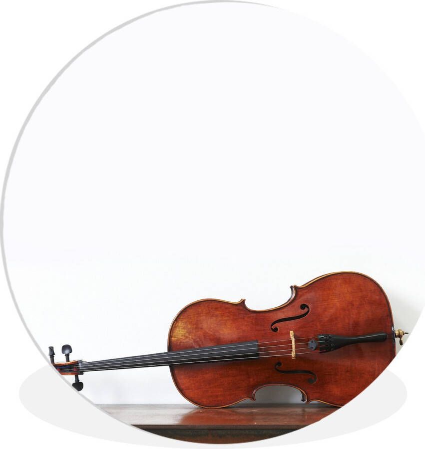 WallCircle Wandcirkel ⌀ 90 Een cello op een houten tafel Ronde schilderijen woonkamer Wandbord rond Muurdecoratie cirkel Kamer decoratie binnen Wanddecoratie muurcirkel Woonaccessoires