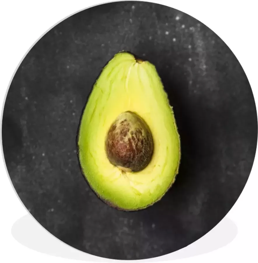 Wandcirkel Muurcirkel Binnen Eenzame avocado op een zwarte tafel 140x140 cm Wanddecoratie Ronde Schilderijen