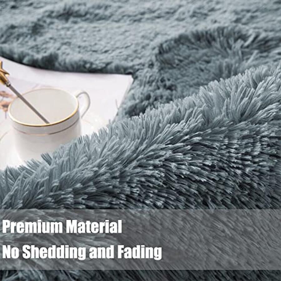 Zacht en modern rond tapijt 90 cm Wasbaar antislip hoogpolig in zeeblauw