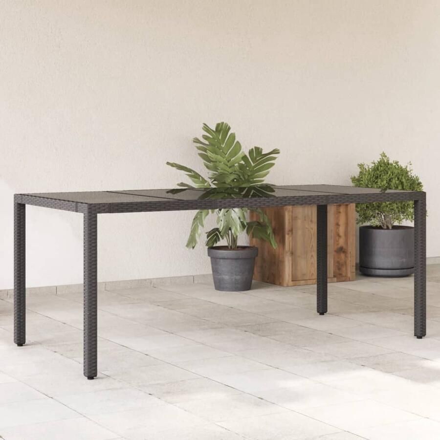 FIONERA Tuintafel met glazen blad 190x90x75 cm poly rattan zwart