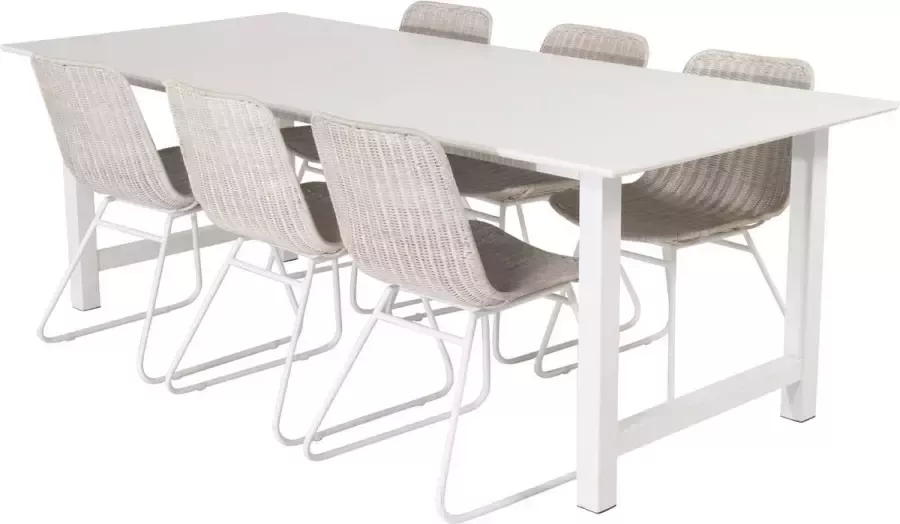 Hioshop CountWH eethoek eetkamertafel wit en 6 Cirebon eetkamerstal rotan whitewash.