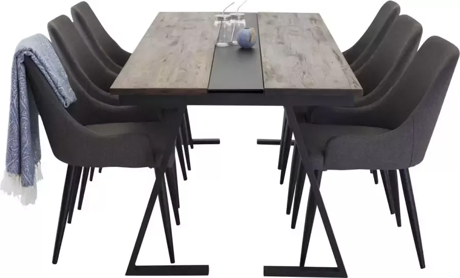 Hioshop Jakarta eethoek eetkamertafel teakhout en 6 Plaza eetkamerstal grijs zwart.