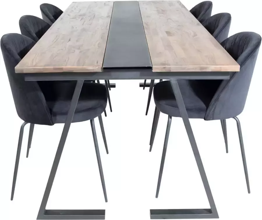 Hioshop Jakarta eethoek eetkamertafel teakhout en 6 Wrinkles eetkamerstal velours zwart.