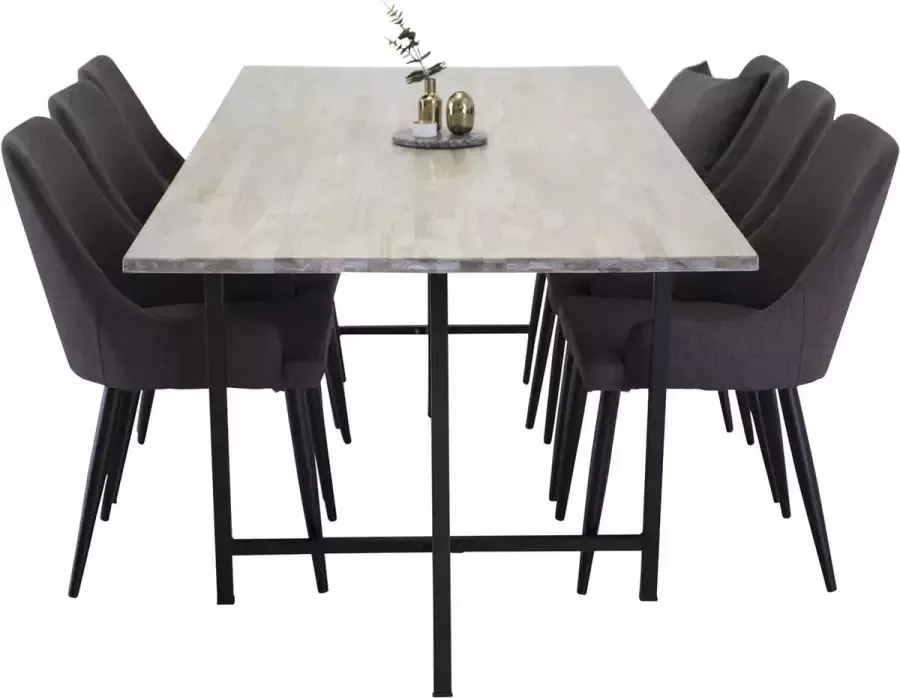 Hioshop Jepara eethoek eetkamertafel teakhout en 6 Plaza eetkamerstal grijs zwart.