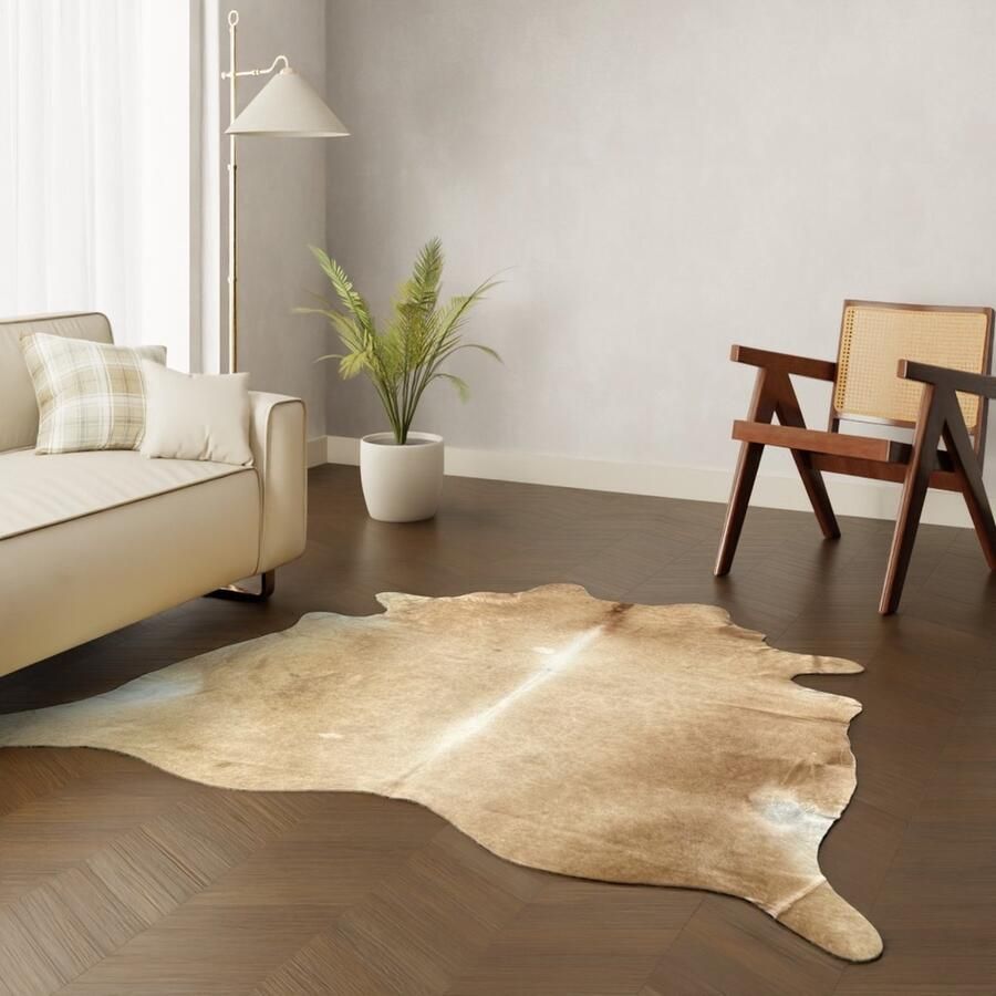 Schapenvachtkopen.nl Cognac koeienhuid vloerkleed koeienkleed tapijt cognackleurig koeienvel dierenhuid dierenvel bruin koehuid tapijt