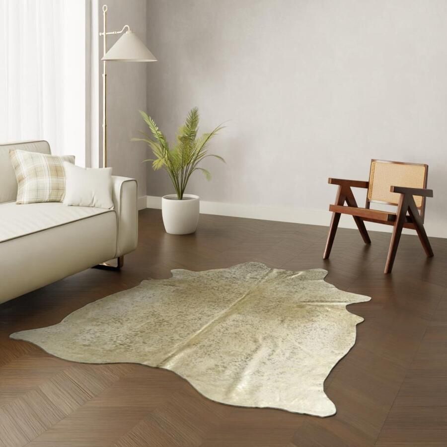 Koeienhuidkopen.nl Gouden koeienhuid Goud geverfde koehuid vloerkleed Gouden koeienvel dierenhuid koeienvacht Dierenhuid vloerkleed tapijt