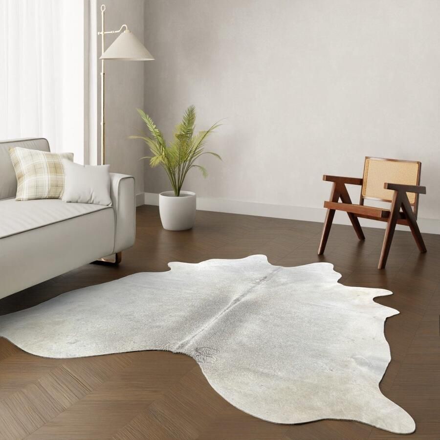 Koeienhuidkopen.nl XL gouden koeienhuid vloerkleed Koeienkleed tapijt goud koeienvel groot Geverfde dierenhuid dierenvel gold koehuid tapijt