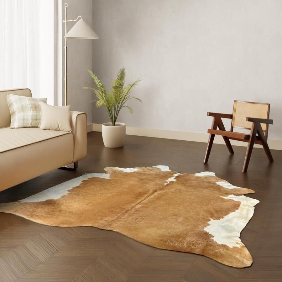 Koeienhuidkopen.nl XL bruin witte koeienhuid vloerkleed Koeienkleed tapijt wit bruin koeienvel groot dierenhuid dierenvel lichtbruin koehuid tapijt