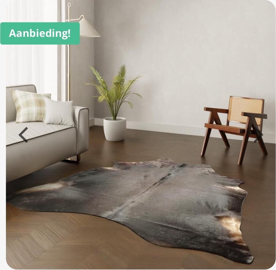 Koeienhuidkopen.nl XL coffee koeienhuid vloerkleed XL koehuid kleed uiterst donkerbruin koeienvel dierenhuid dierenvel vloer koffie kleur