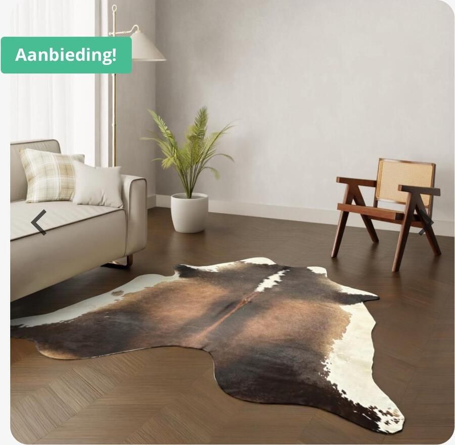 Koeienhuidkopen.nl XL donkerbruin wit koeienhuid vloerkleed Koeienkleed tapijt donkerbruin wit koeienvel groot bonte dierenhuid dierenvel bruin koehuid tapijt