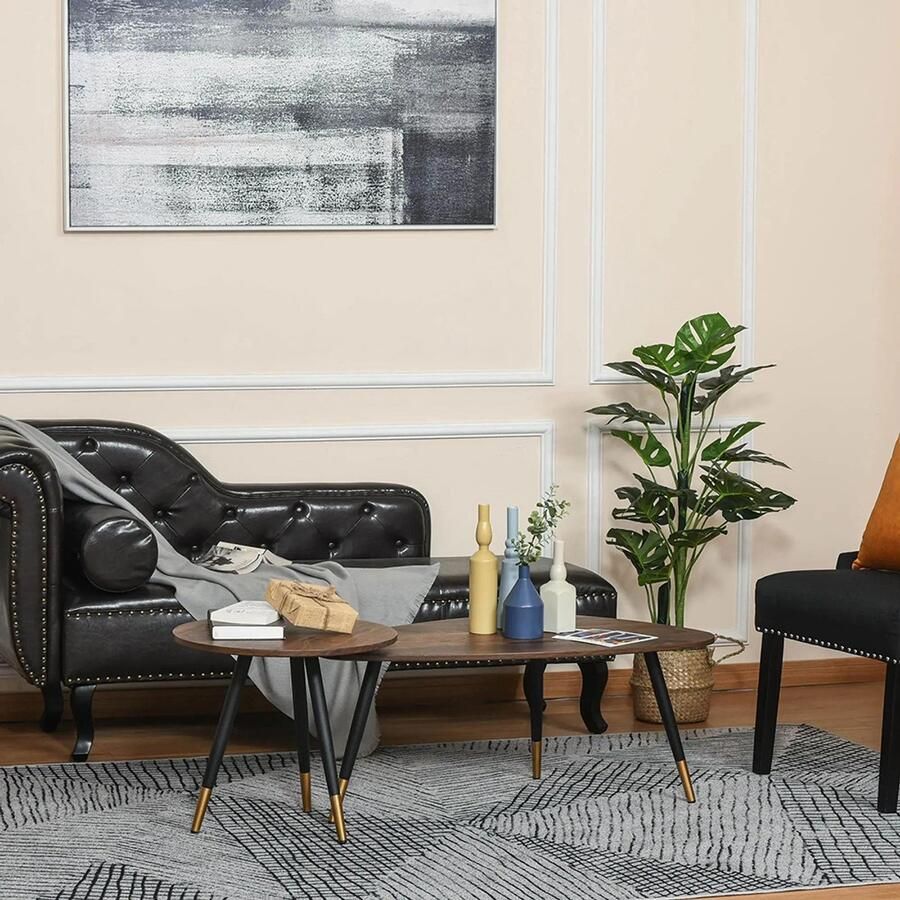 KOMHTOM Set van 2 uitschuifbare salontafels in art-decostijl. Taps toelopende poten van zwart metaal met vergulde uiteinden. MDF-tafelbladen met donker teakhoutlook