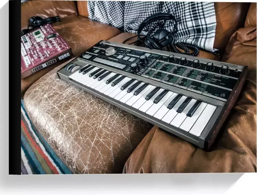 KuijsFotoprint Canvas Piano liggend op Bank 40x30cm Foto op Canvas Schilderij (Wanddecoratie op Canvas)