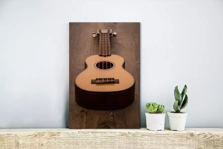 MuchoWow Canvas Schilderij Akoestische gitaar op een houten tafel 20x30 cm Wanddecoratie