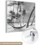 MuchoWow Glasschilderij 90x90 cm Schilderij acrylglas Hangmat op strand van Dominicaanse Republiek zwart-wit Foto op glas Schilderijen - Thumbnail 1