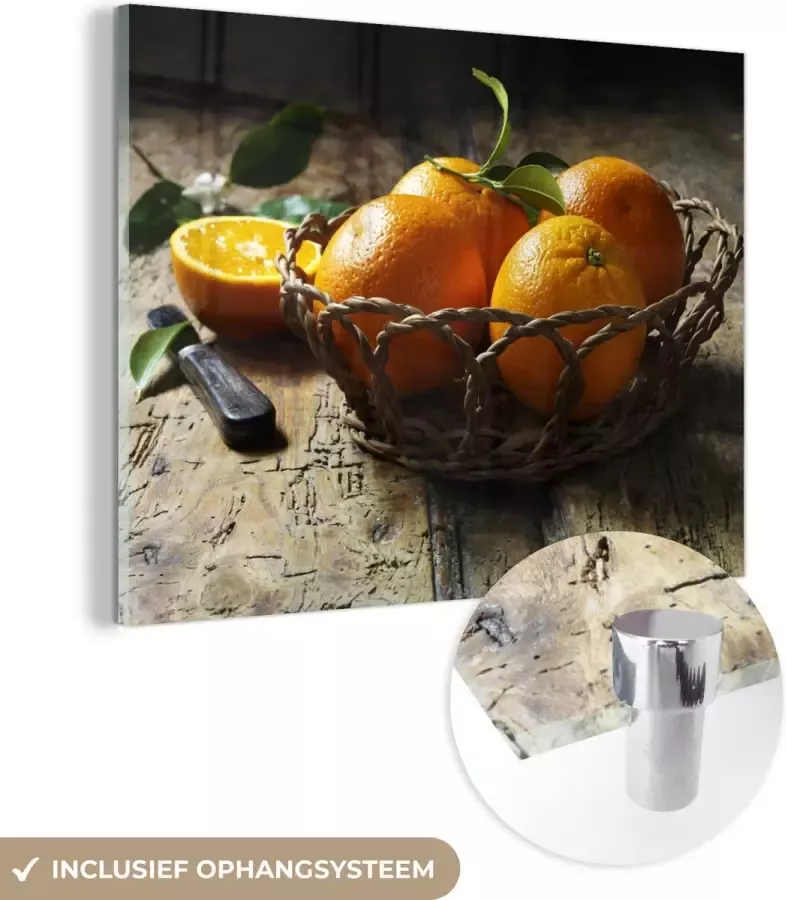 MuchoWow Glasschilderij 80x60 cm Schilderij glas Fruitmand Sinaasappel Mes Tafel Foto op acrylglas Schilderijen