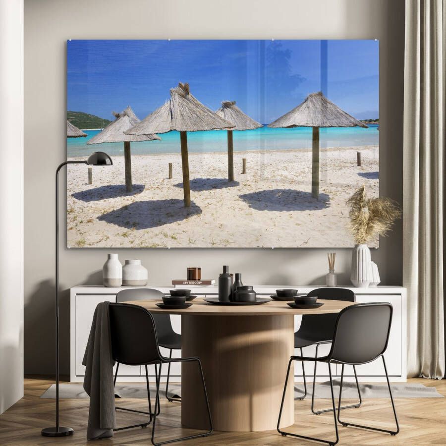 MuchoWow Glasschilderij Rieten parasols op een strand op de vakantiebestemming Corsica 150x100 cm Acrylglas Schilderijen Foto op Glas