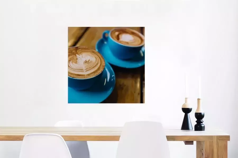 MuchoWow Glasschilderij Twee blauwe koppen koffie op een houten tafel 50x50 cm Acrylglas Schilderijen Foto op Glas