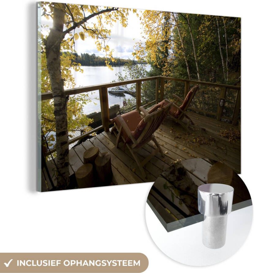 MuchoWow Glasschilderij 150x100 cm Schilderij acrylglas Twee ligbedden op het dek van een cottage Foto op glas Schilderijen
