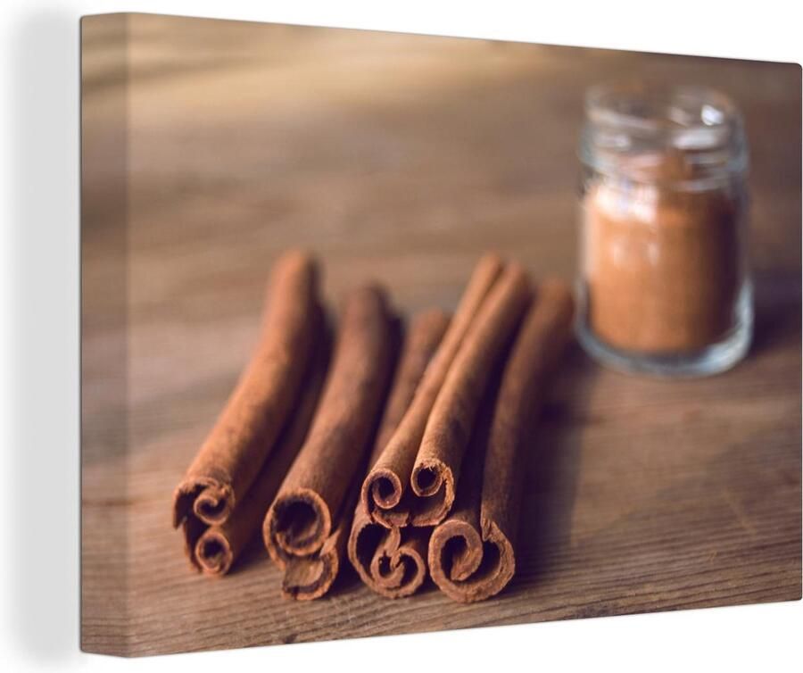 MuchoWow Canvas Schilderij Aromatische kaneelstokjes op een houten tafel 120x80 cm Wanddecoratie