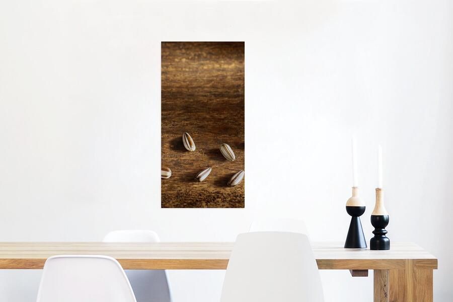 MuchoWow Glasschilderij Tien zonnebloempitten op houten tafel 60x120 cm Acrylglas Schilderijen Foto op Glas