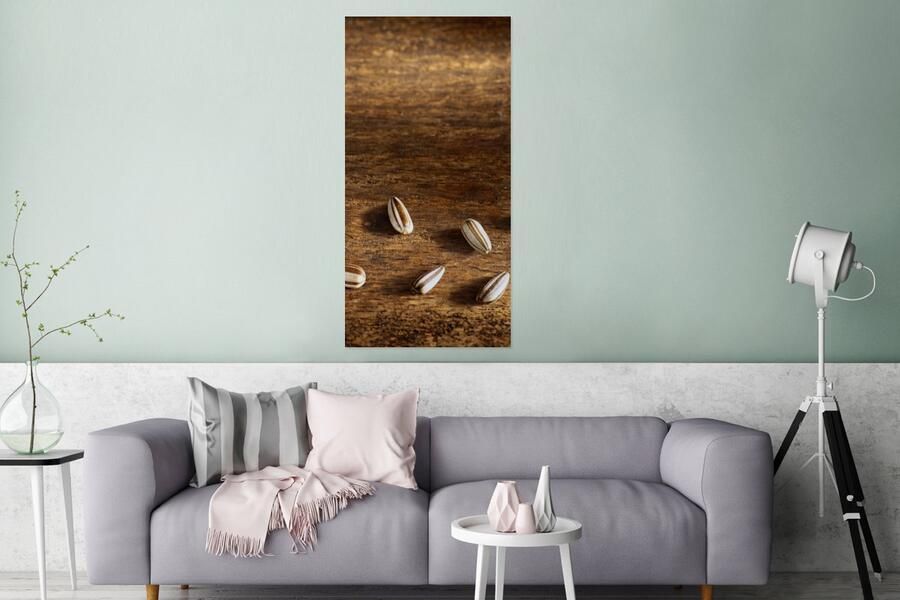 MuchoWow Glasschilderij Tien zonnebloempitten op houten tafel 80x160 cm Acrylglas Schilderijen Foto op Glas