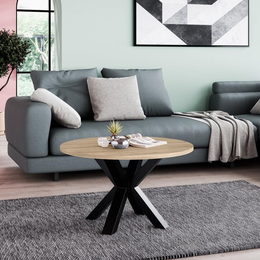 Neew by George Azzar Neew by George Azzar – Design Salontafel NOE Ø58 cm – Sonoma Eiken Rond Tafelblad – Metalen Spinpoot – Industrieel & Modern – Bijzettafel Koffietafel – Compact & Stevig – Luxe Meubel voor Woonkamer Lounge Slaapkamer