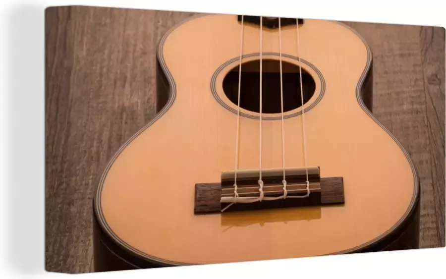 OneMillionCanvasses Canvas Schilderij Akoestische gitaar op een houten tafel 160x80 cm Wanddecoratie