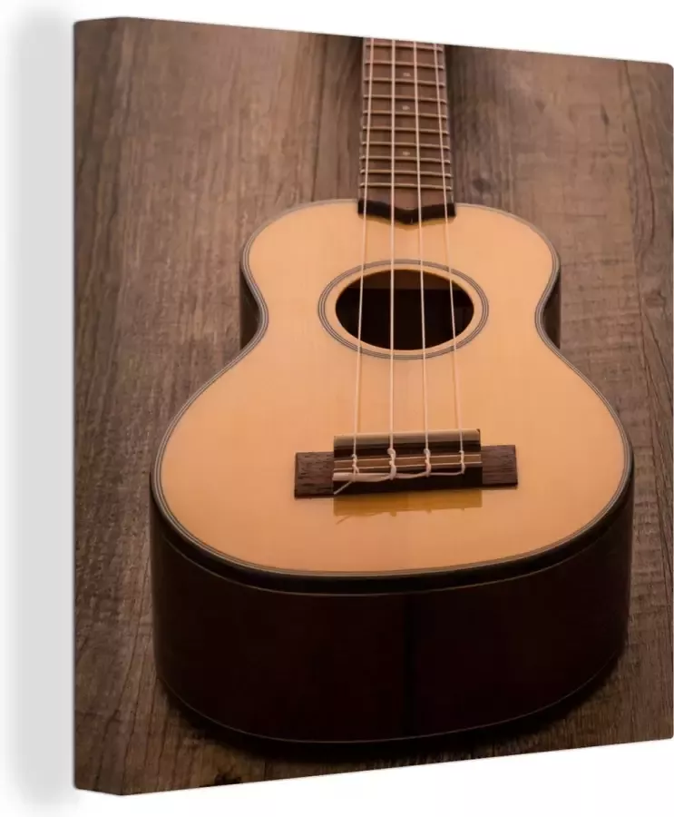 OneMillionCanvasses Canvas Schilderij Akoestische gitaar op een houten tafel 50x50 cm Wanddecoratie
