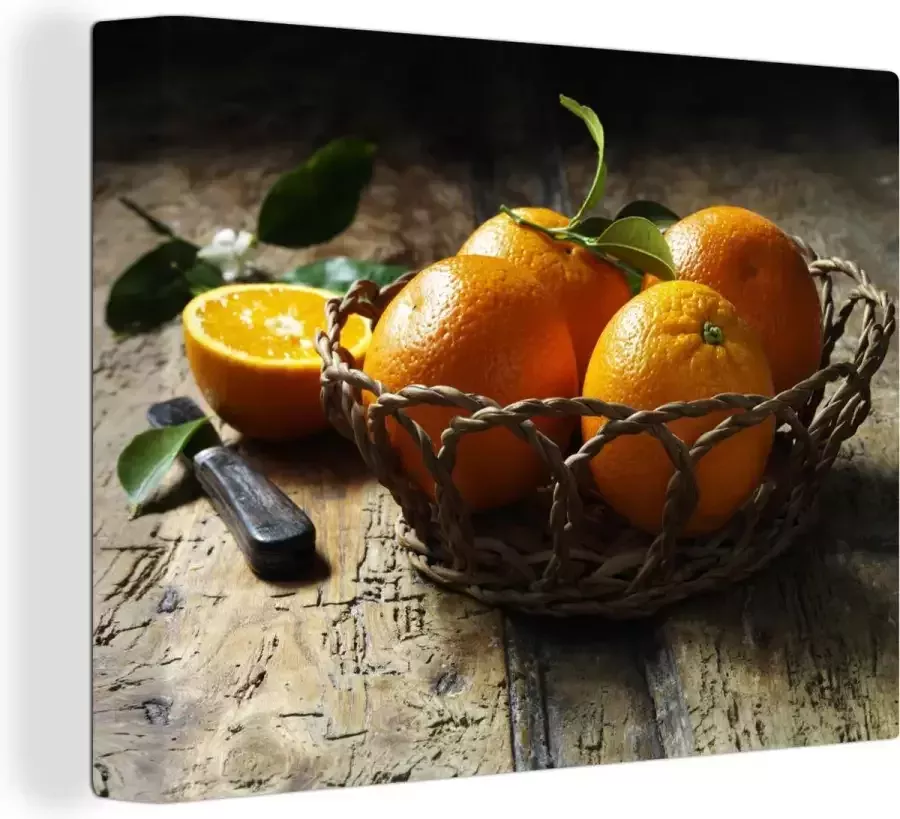 OneMillionCanvasses Canvas Schilderij Fruitmand Sinaasappel Mes Tafel 120x90 cm Wanddecoratie