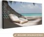 OneMillionCanvasses Canvas Schilderij Hangmat Boek Strand 40x20 cm Wanddecoratie - Thumbnail 2