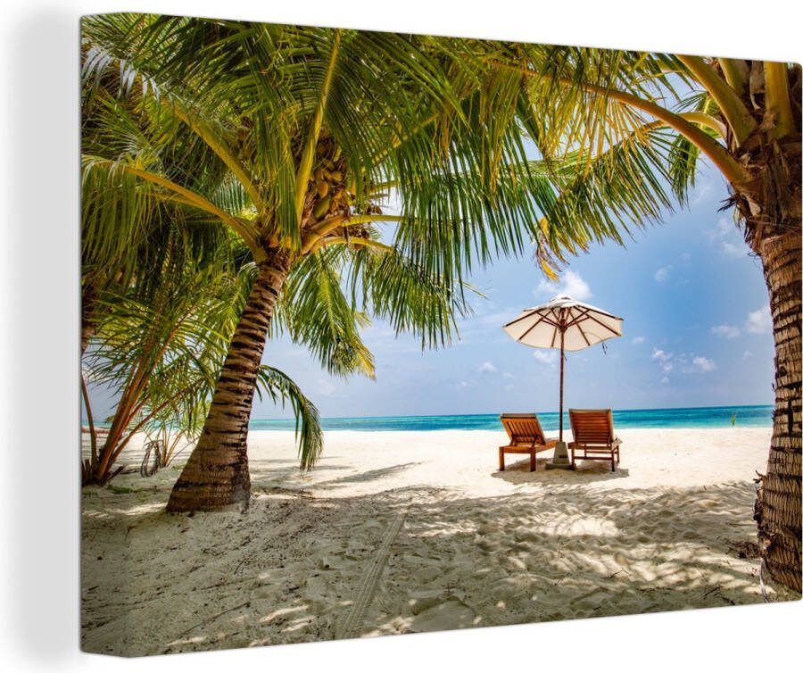 OneMillionCanvasses Canvas schilderij 140x90 cm Wanddecoratie Ligbedden tussen de palmbomen op een strand van Bali Muurdecoratie woonkamer Slaapkamer decoratie Kamer accessoires Schilderijen