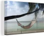 OneMillionCanvasses Canvas Schilderij Palmboom Hangmat Strand 120x80 cm Wanddecoratie - Thumbnail 1