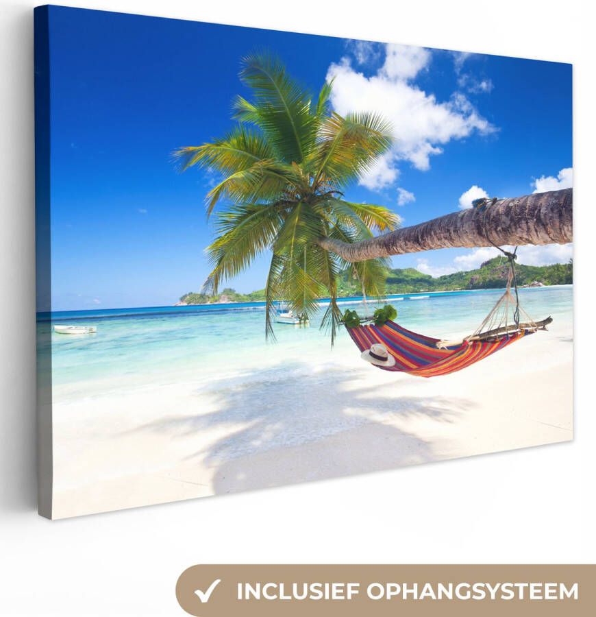 OneMillionCanvasses Canvas schilderij 140x90 cm Wanddecoratie Strand Hangmat Zee Palmboom Muurdecoratie woonkamer Slaapkamer decoratie Kamer accessoires Schilderijen