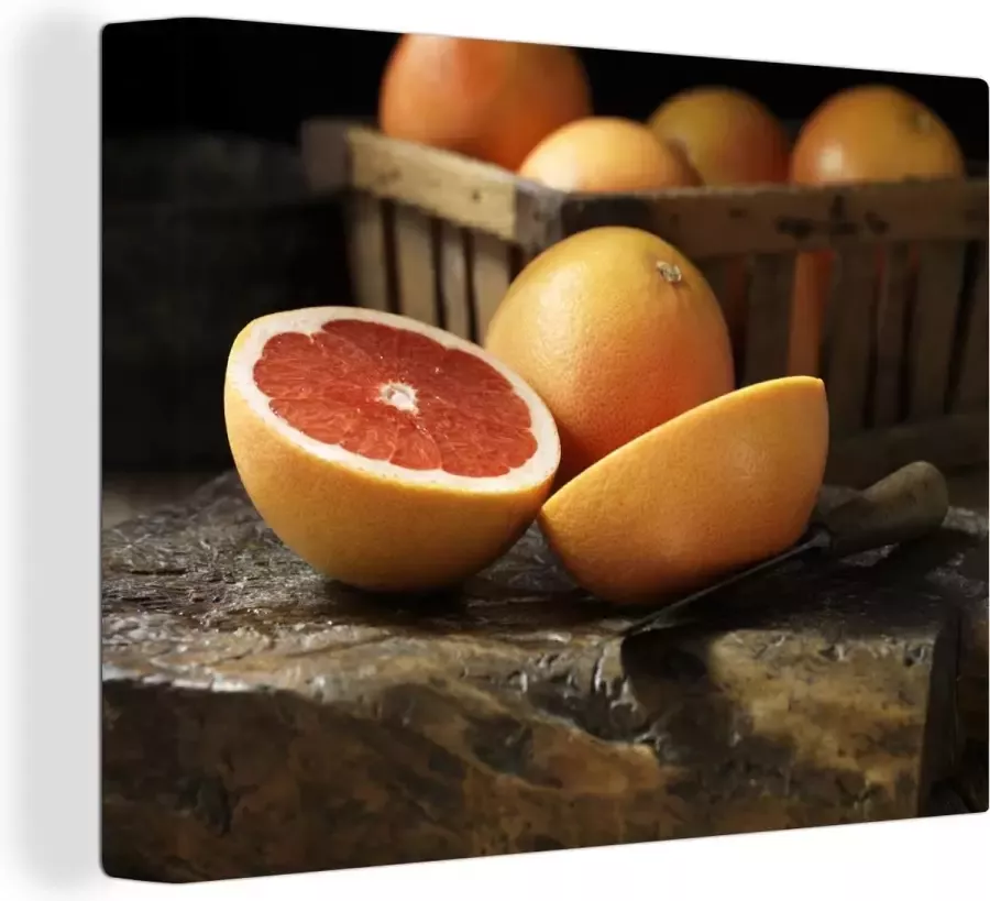 OneMillionCanvasses Canvas Schilderij Verse grapefruit in een mand op houten tafel 120x90 cm Wanddecoratie