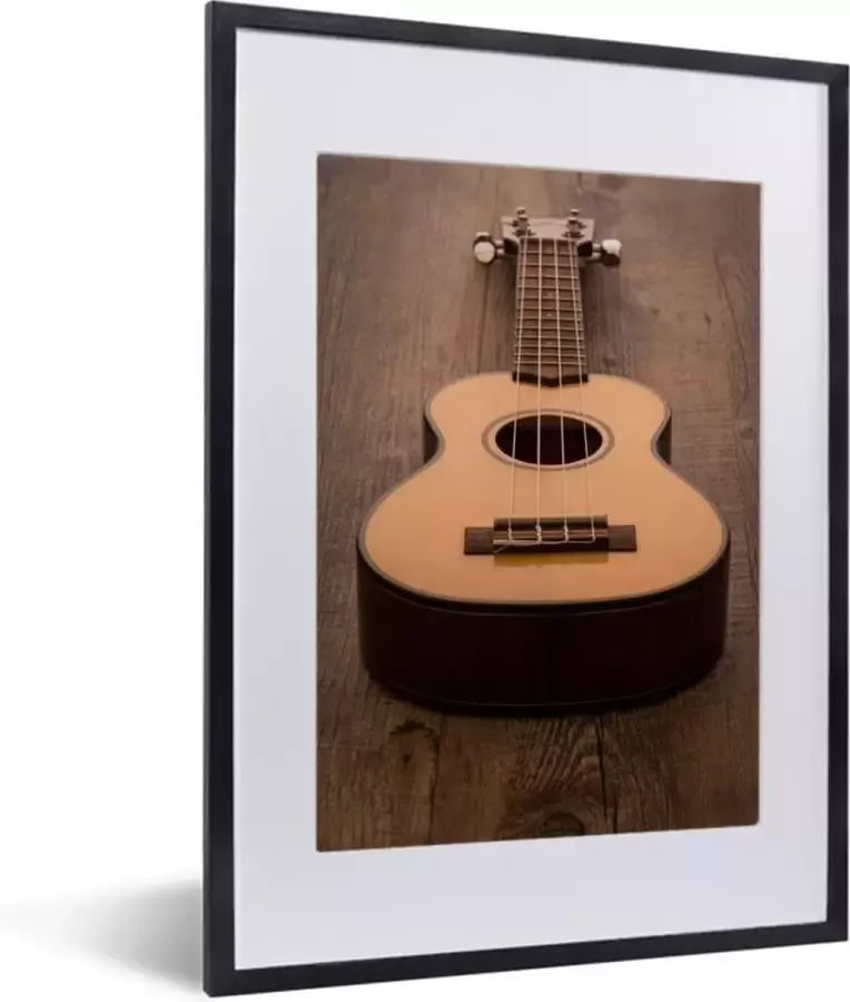 PosterMonkey Fotolijst incl. Poster Akoestische gitaar op een houten tafel 30x40 cm Posterlijst
