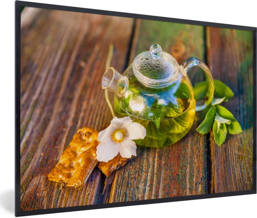PosterMonkey Fotolijst incl. Poster Glazen theepot op een houten tafel 30x20 cm Posterlijst