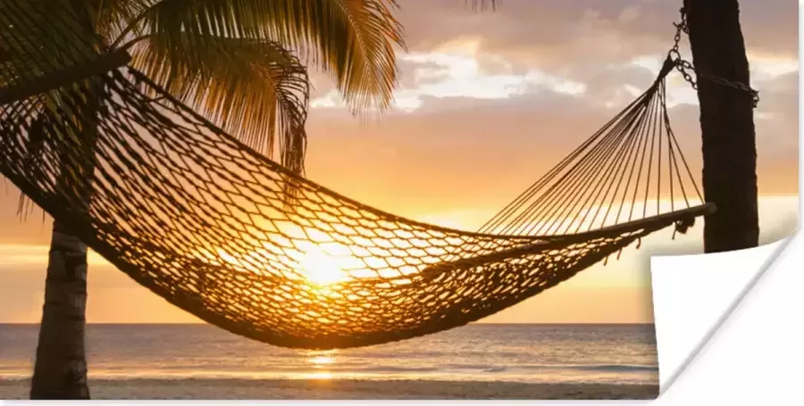 PosterMonkey Poster Hangmat op strand tijdens zonsondergang in Jamaica 40x20 cm